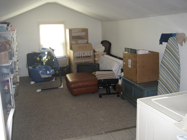 An easily accessed bonus room can be used for storage, an office, crafting...etc. - 602 Creekvalley Rd.