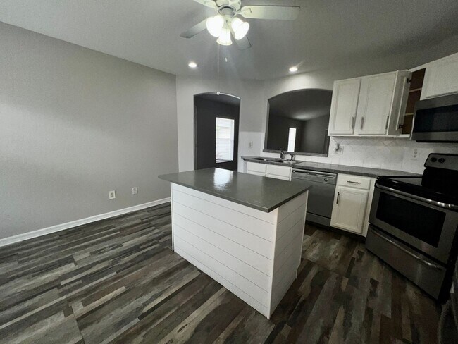 Photo - RESERVE AT WEDGEFIELD 3 bedroom 2 bath home with stainless appliances, laminate flooring and a fe...