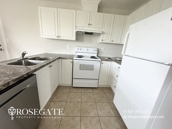 Building Photo - Pet-Friendly 2-Bedroom Apartment with Garage & Driveway Parking – Hamilton Unit 112