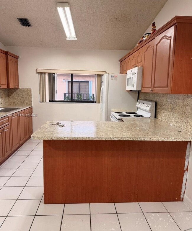 Photo - 7880 W 29th Way Unit 201