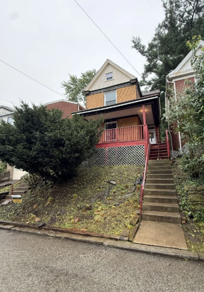 Building Photo - 7656 Highland Ave