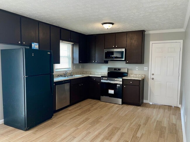Photo - Remodeled 3 Bed/2.5 Bath w/ Laminate Hardwood Throughout...NO Carpet!