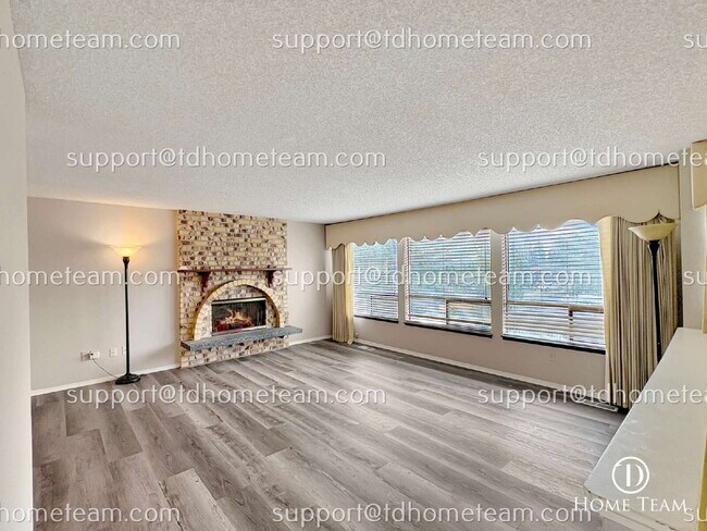 Photo - "Spacious 4-Bed Oasis with Granite Touches & Finished Basement in Renton!"