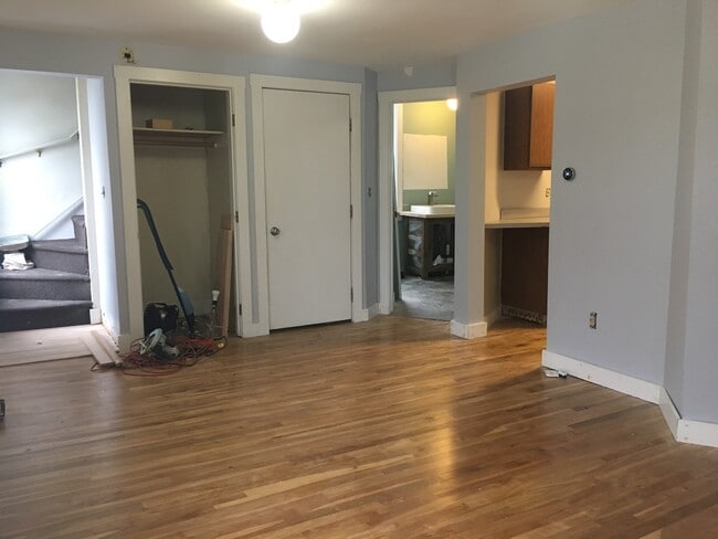 Living room looking toward kitchen/bath (and second egress). Please excuse the evidence of the final stages of renovation! - 12 Boynton Street Unit Apt 3