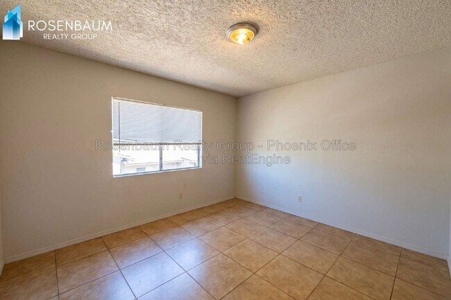 6440 E Alder Ave Unidad 203