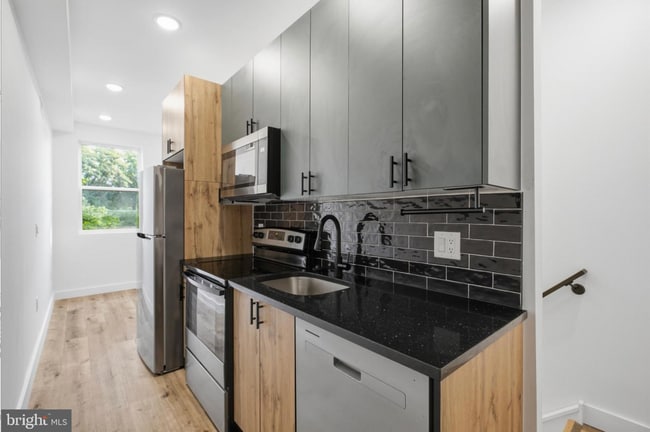 Building Photo - 4243 Mantua Ave Unit B