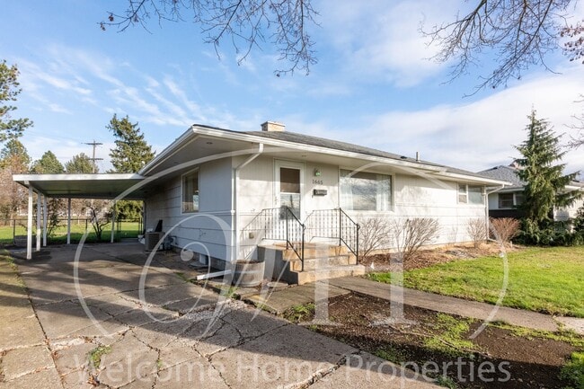 Photo - Spacious 5 Bedroom Home with Fenced Yard & Covered Parking