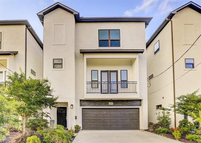 Building Photo - 1057 W 25th St Unit A