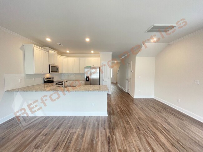 Photo - Amazing 3 Bedroom 1-Car Garage End Unit To...