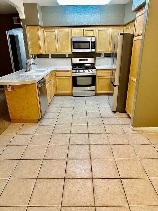 310 E McCoy Ln