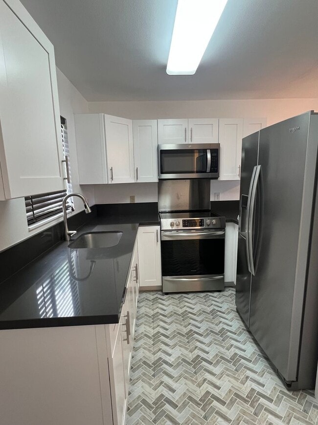 Photo - Kulalani Village in Kapolei - 2 Bedroom 1.5 Bath 2 Parking Townhome Unit