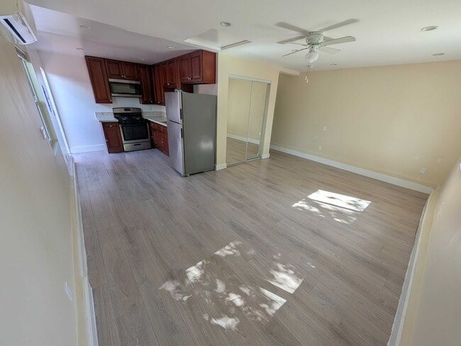 Open layout with kitchen and living area - 6534 Peterson Ave