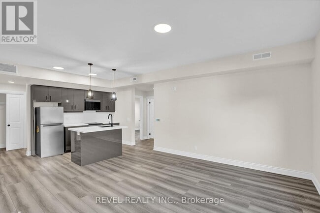 Photo - 261 King St E Unité 2D