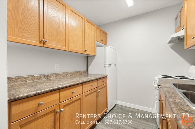Photo - Main Floor Unit, Assigned Parking, Onsite Laundry, BONUS INCENTIVE
