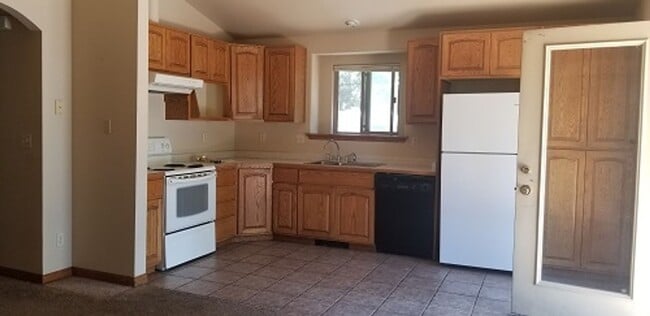 Photo - Spacious 4 Bed, 2 Bath Home with Finished Basement, Large Deck & Yard Near CSU