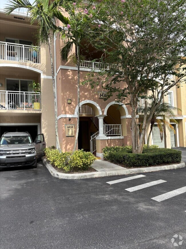 Building Photo - 6434 Emerald Dunes Dr Unit 303 Rental