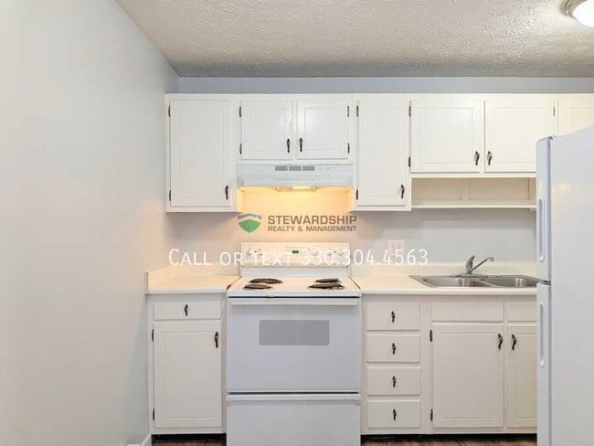 Building Photo - 1111 N Elm St Unit E