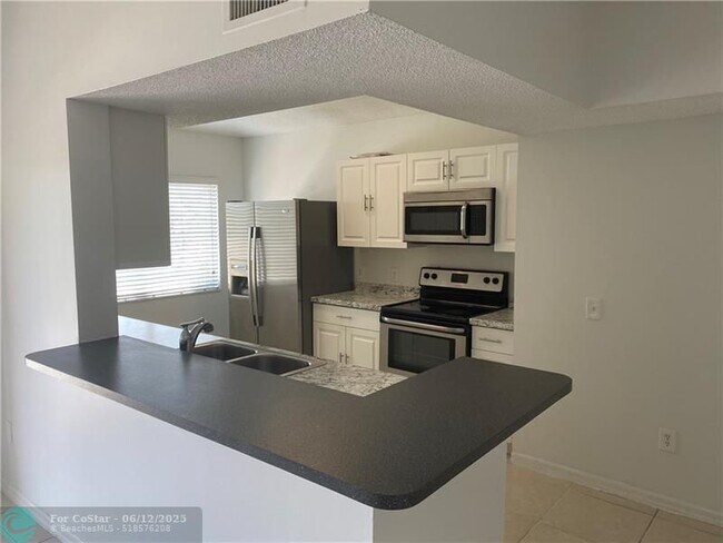 Photo - 9640 NW 2nd St Unidad 5-302