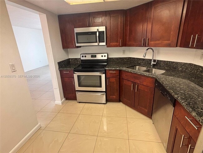 Building Photo - 7410 SW 82nd St Unit K203