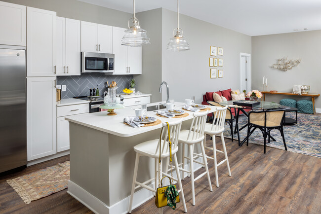 Scheme 1 Kitchen, Dining Area, and Living Area - Avalon Highland Creek Apartments