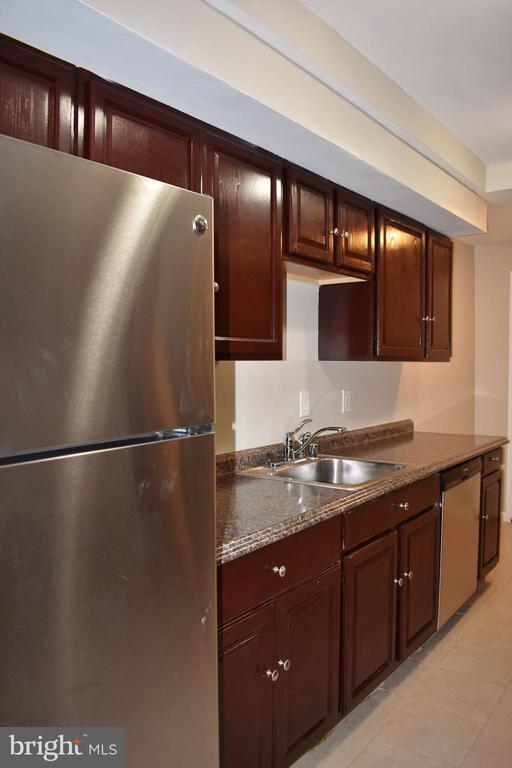Building Photo - 10246 Prince Pl Unit 22-T4