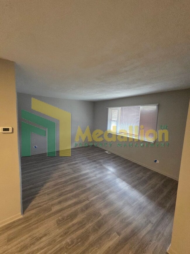 Photo - Updated 5-Bedroom Home with Finished Basement and Fenced Yard