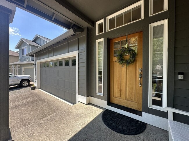 Photo - Spacious 3-Bedroom Home with Two Living Areas, Private Balcony, Fireplace & Attached 2-Car Garage
