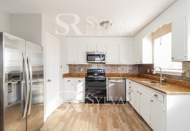 Photo - The living is easy in this 3 bedroom, 2.5 bathroom home