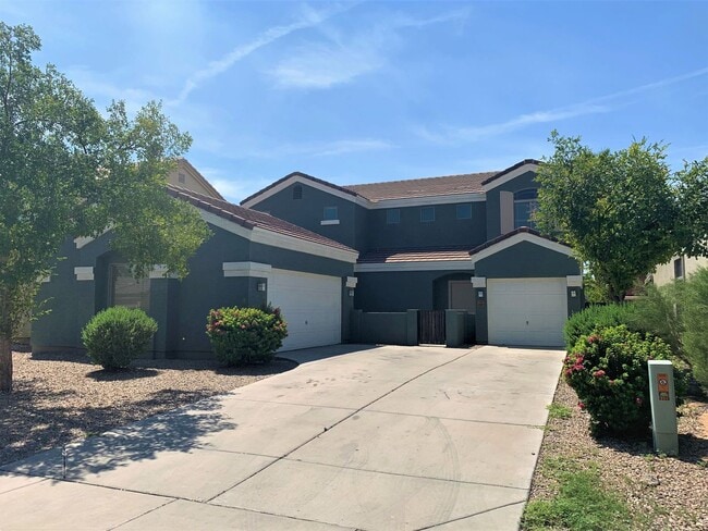 Building Photo - 4 bed 3 bath with 3 car garage in loving T... Rental