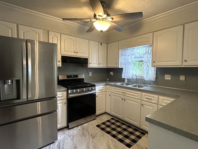 Photo - Charming Split-Level Home with Spacious Yard & Modern Updates – Ideal Location!