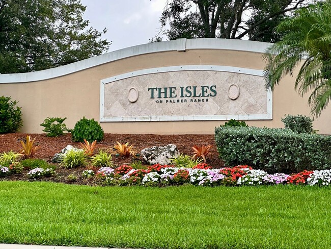 Building Photo - 4-bd, 4-bth in The Isles - One Of Palmer Ranch’s Most Sought After Community