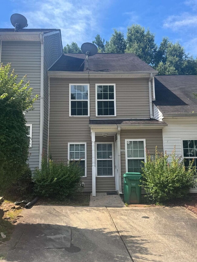 Building Photo - Built in 2004, this two-story townhouse in the Wellington Walk community offers 1,205 square feet...