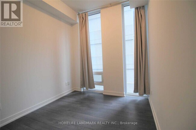 Photo - 28 Wellesley St E Unit 1109