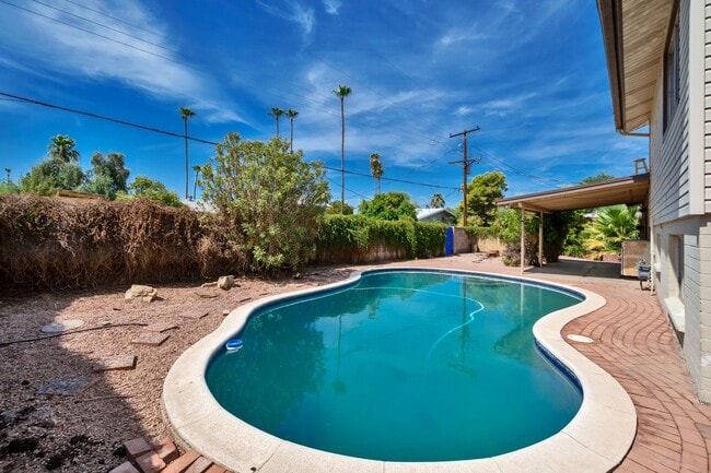 Photo - 6-Bedroom Residence Featuring Pool, Turf Yard & 2-Car Garage