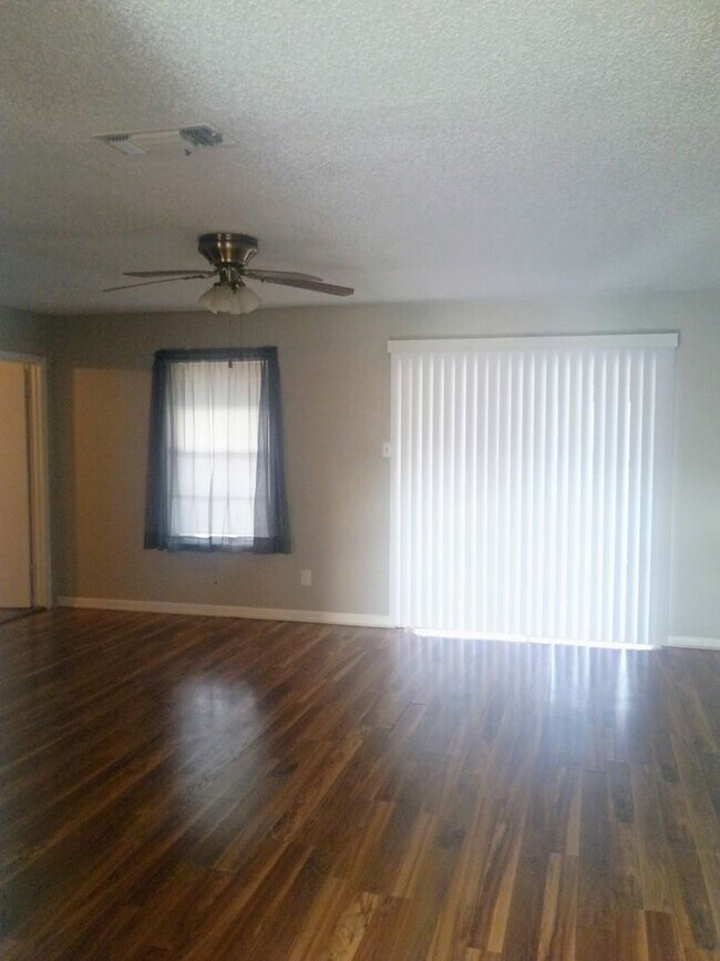 Photo - Updated 3/2 Home with 2-Car Garage + Air-Conditioned Workshop!