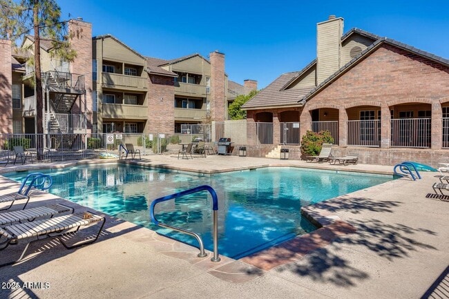 Building Photo - 200 E Southern Ave Unit 209