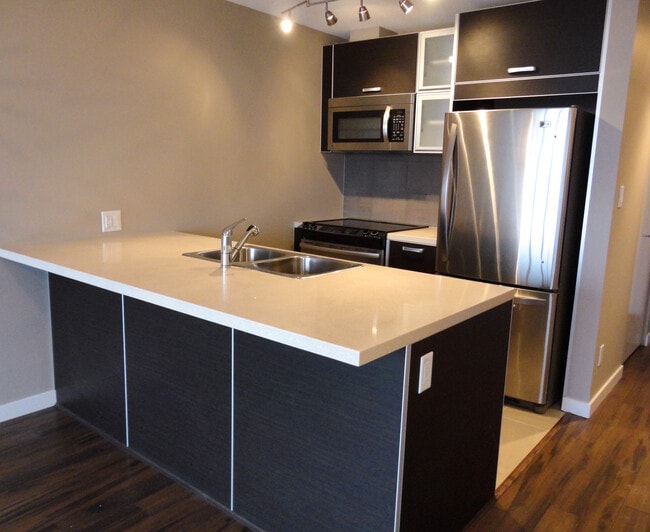 Photo - 308-9981 Whalley Boulevard Unit 308