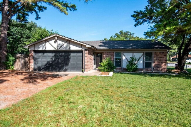 Photo - "Inviting 4/2/2 with Open Living, Flexible Spaces, and a Spacious Backyard!"