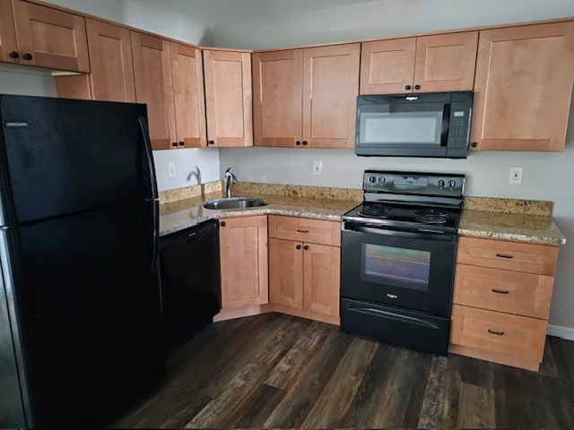 Recently renovated full kitchen. - 12 E Main St Apartment Unit #1