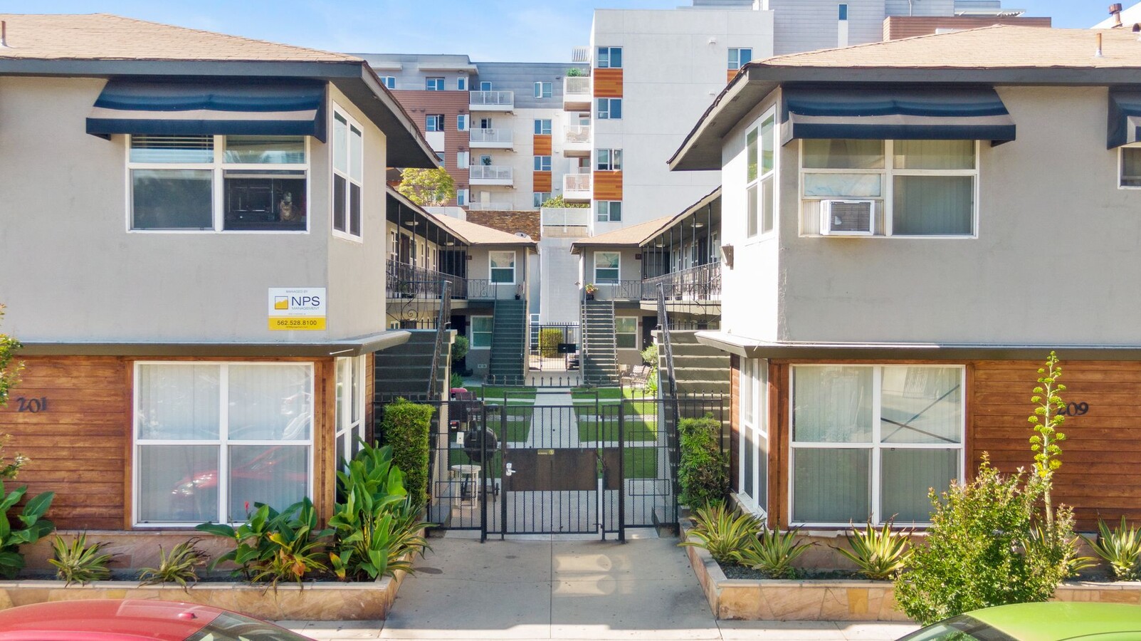 201-209 E 12th Street - 201-209 E 12th Street