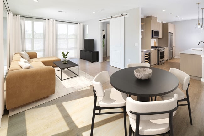 Signature Collection dining and living areas with hard-surface vinyl plank flooring - Avalon W Squared