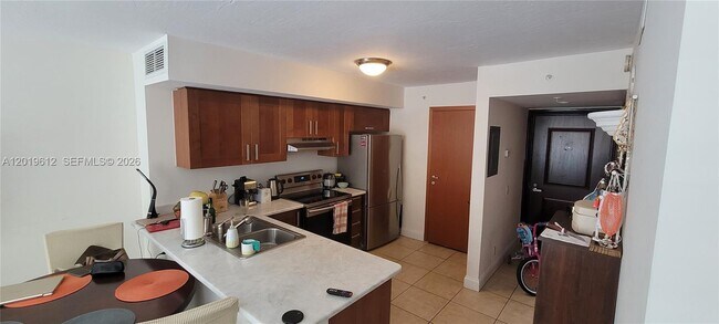 9499 Collins Ave Unit 705