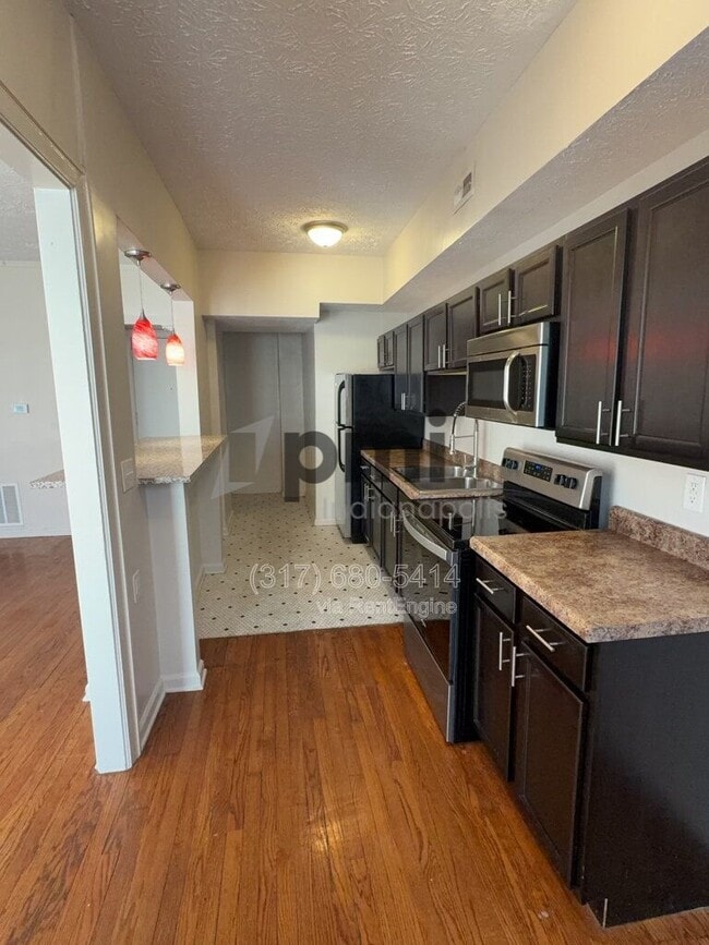 Photo - 1 W 28th St Unidad 208