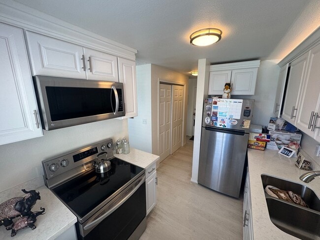 Photo - Gorgeous Condo in Seward Park with 2 Parking Spaces, Steps Away from Pool with Water View! Unit 203