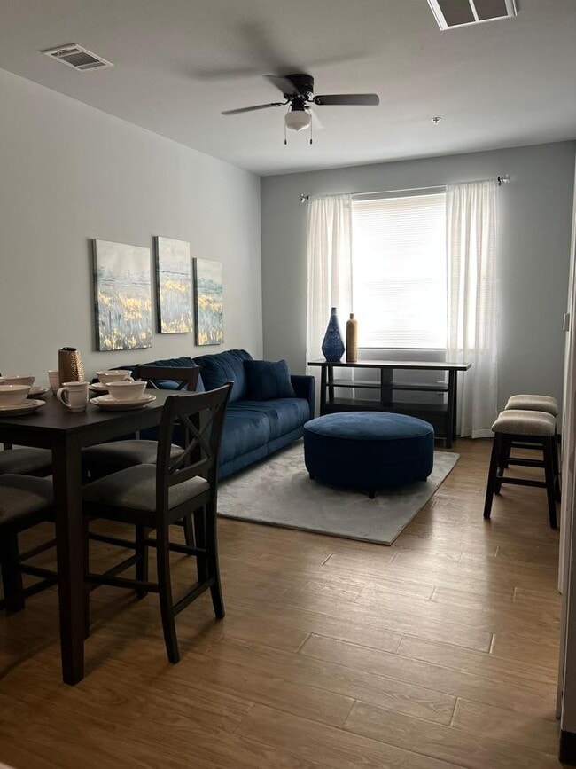 1 BEDROOM LIVING ROOM - Reserve at Richards Apartments