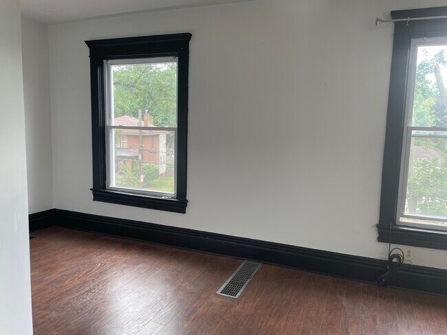 Living Room Three Large Windows - 6319 Monitor St