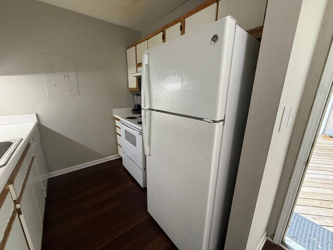 Photo - 4 Bed 4 Bath Condo near NCSU! Available late July, includes utilities!