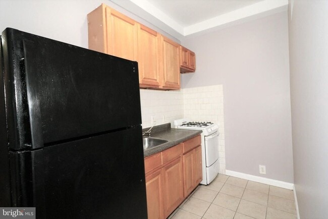 Building Photo - 1709 Gwynns Falls Pky Unit 1