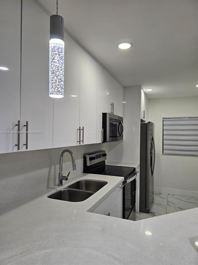 Building Photo - 6405 W 27th Ln Unit 103-15 Rental