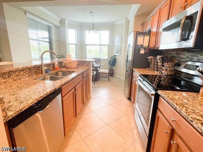 Building Photo - 9820 Giaveno Cir Unit 1412